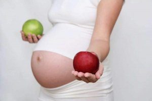 почему болит голова при беременности